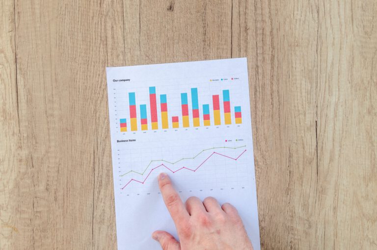 Person looking over figures