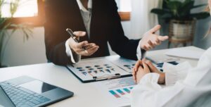 A financial advisor talks with a client about wealth management